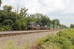 NS 6783 leads a westbound container train through cove PA